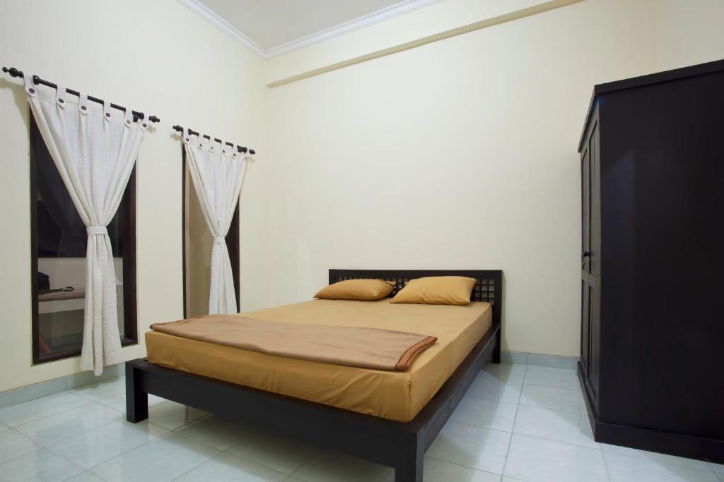 Pondok Taman 828 Hotel Dempassar Quarto foto